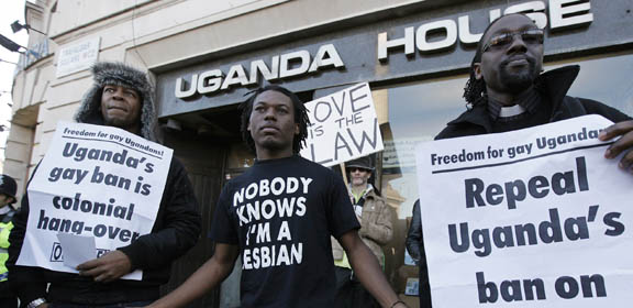 Demonstrators protest outside the Uganda