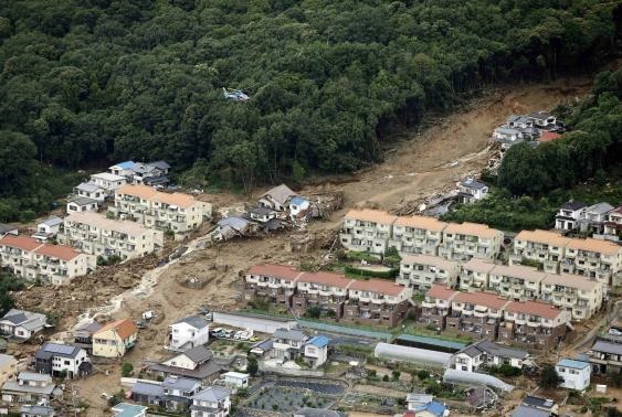 An aerial view shows a landslide that swept through a residential area at Asaminami ward in Hiroshima, western Japan