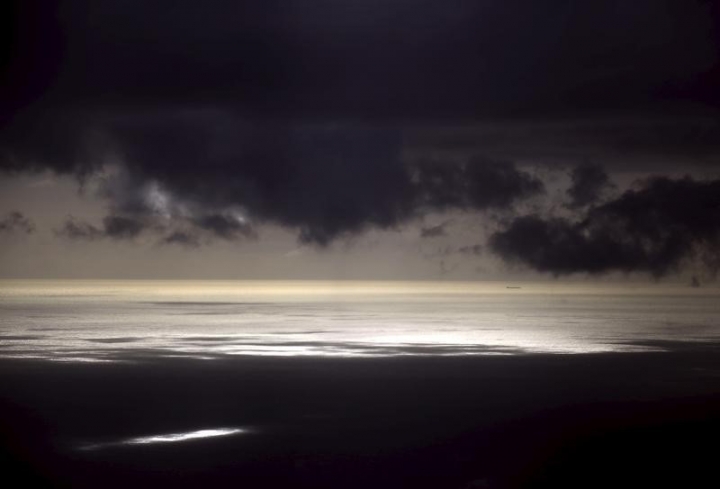 Bir kömür gemisinin üstündeki fırtına bulutları. Gemi Queensland Avusturalya’daki Bundaberg şehrinin kuzey-doğusunda yer alan Lady Elliot adası yakınlarında seyrederken. Fotoğraf: REUTERS/David Gray