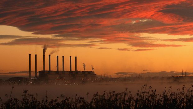 MELBOURNE, AUSTRALIA - MARCH 21:  A view of the Hazelwood Power Station across the cooling pondage at sunrise on March 21, 2012 in Melbourne, Australia. The brown coal fueled power station, located in Latrobe Valley is the oldest in Victoria and provides the state nearly 25% of its energy. In 2005 Hazelwood  was labeled Australia's least carbon efficient power station by WWF Australia and continues to be a target of issue of environmentalist groups.  (Photo by Hamish Blair/Getty Images)